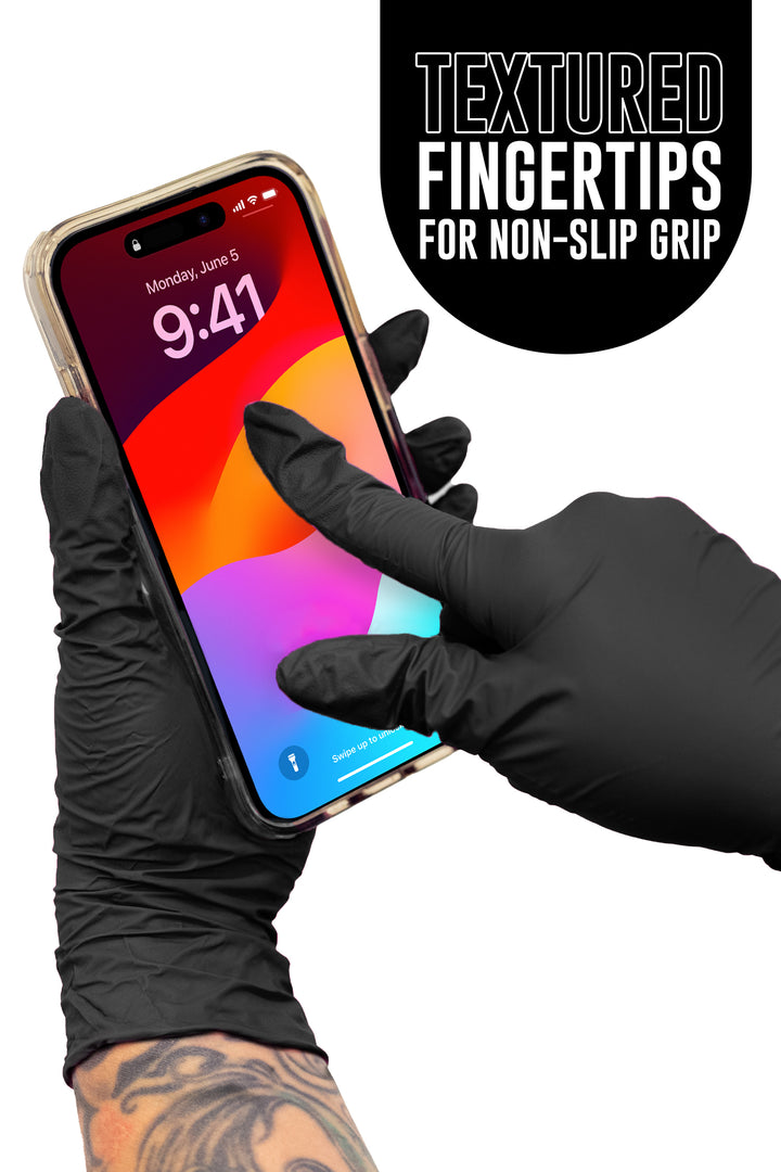 Gloved fingertip tapping a smartphone screen, with the text Textured fingertips for non-slip grip