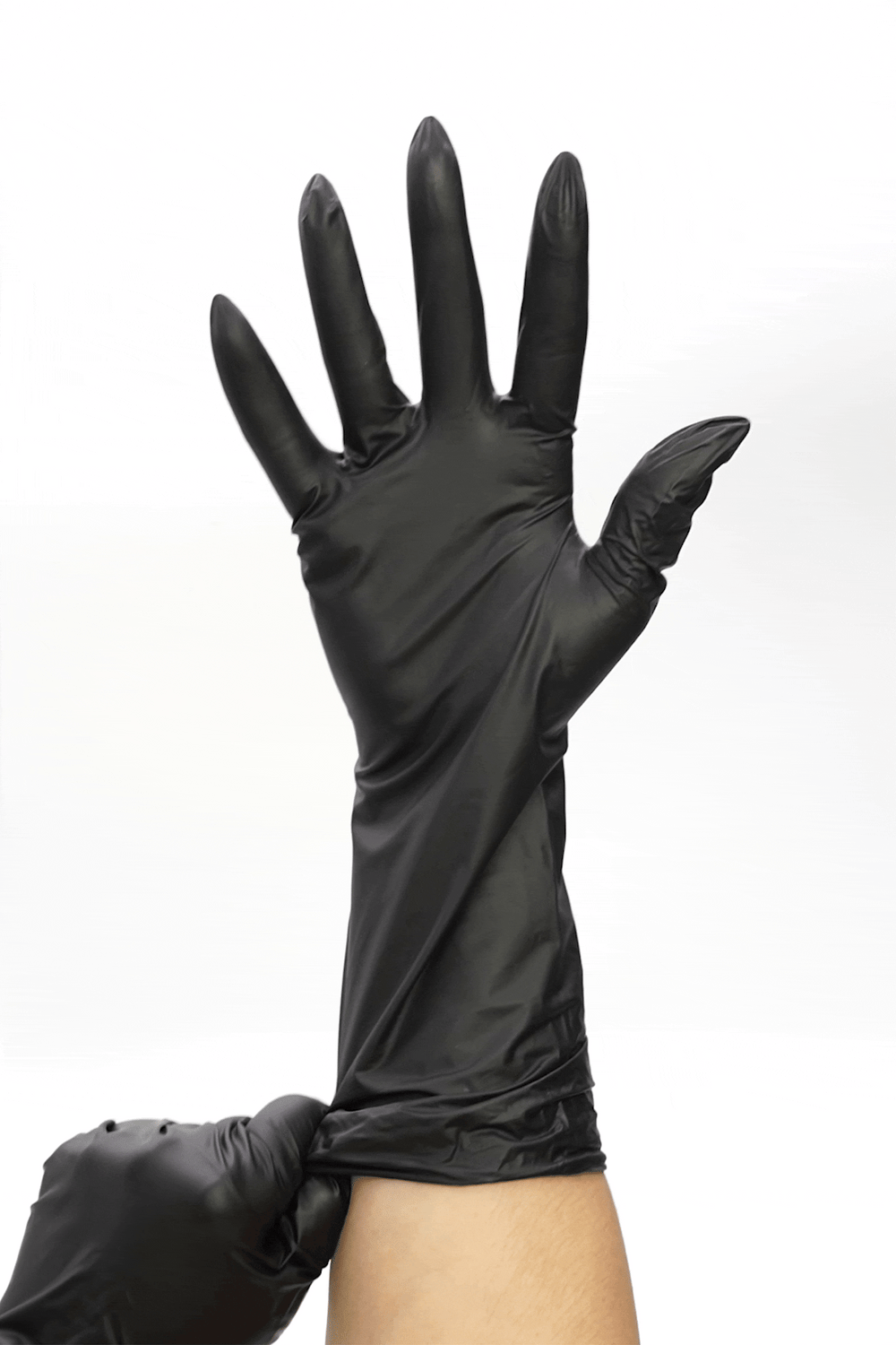 Animation of a black vinyl glove being pulled down the forearm to show the full length of the extended cuff