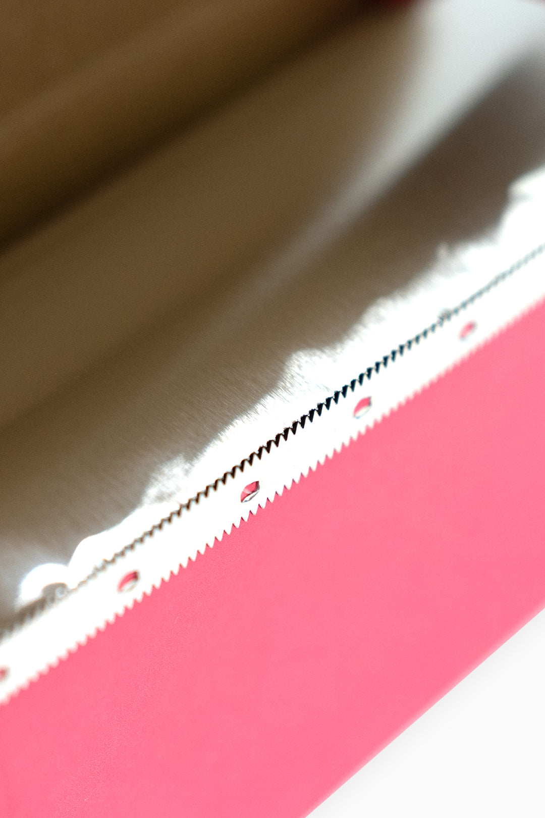 Close-up of the pink dispenser box&