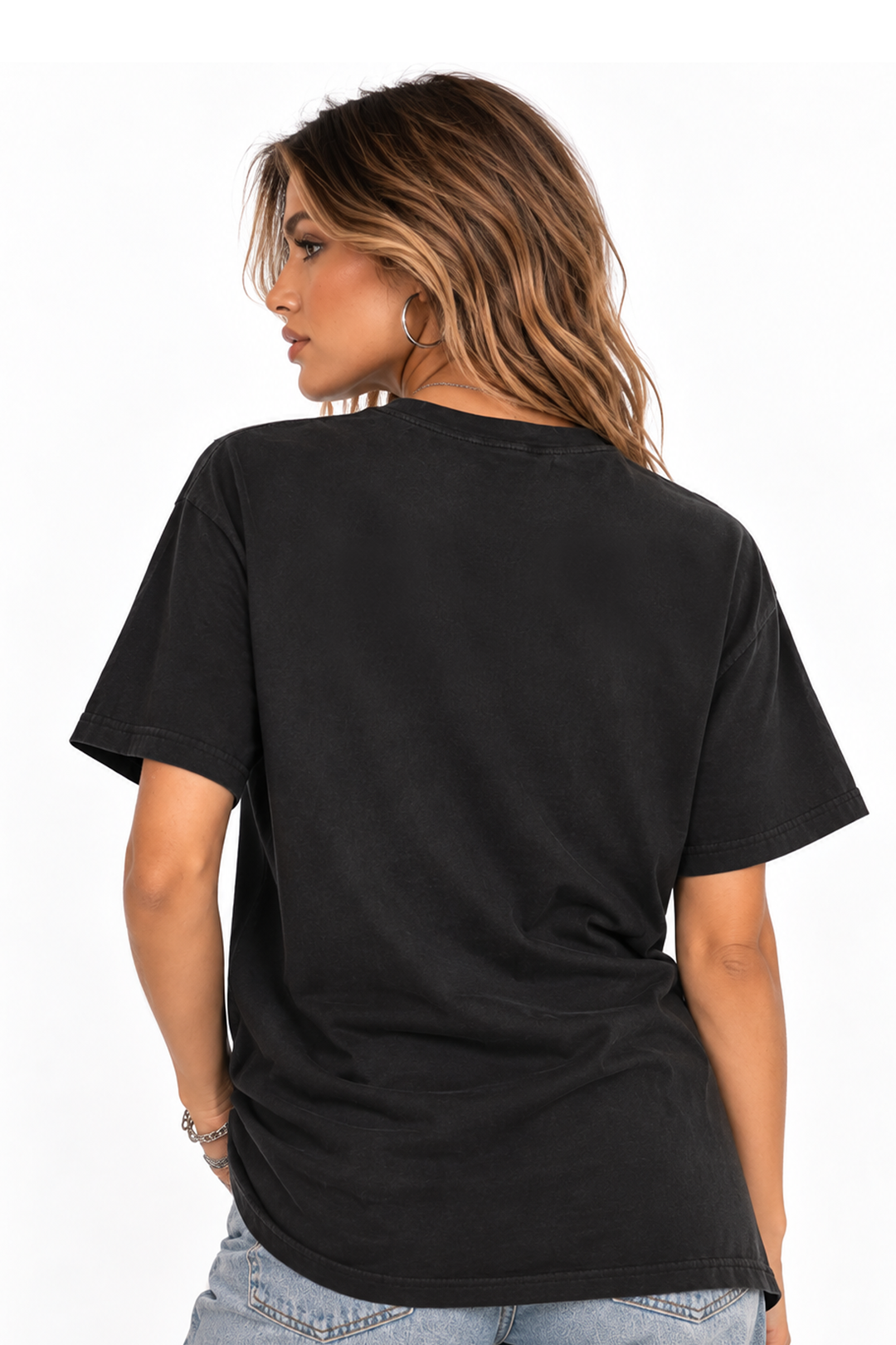 Back of the black tee on a second model, plain with no print, relaxed fit